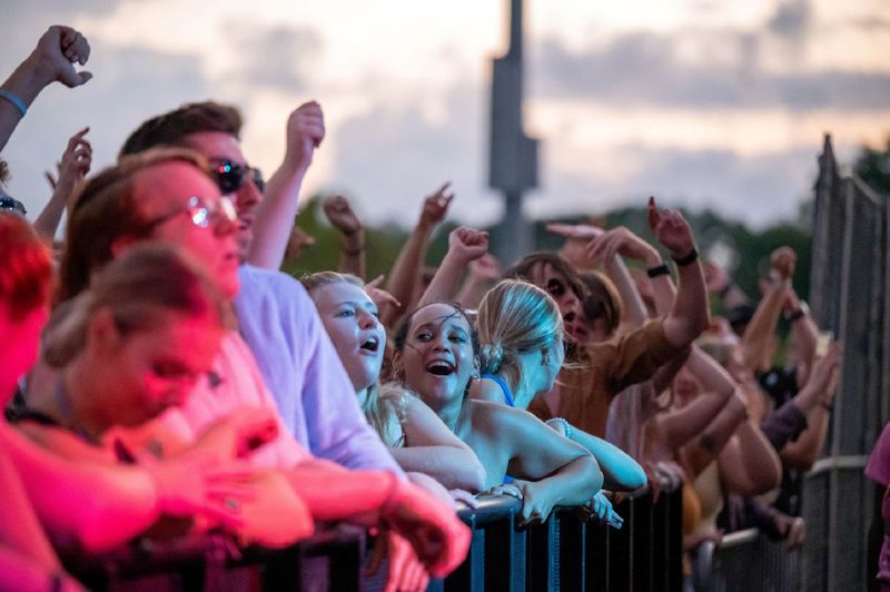 Students in the front row cheer during the Yung Gravy concert at Penn State Behrend.