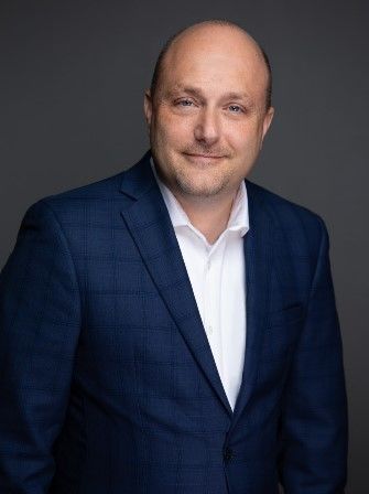 A portrait of Steven D. Bugajski, an executive in residence at Penn State Behrend.