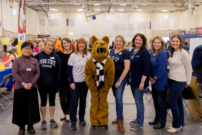 Group of women posing with the Penn State Nittany Lion mascot