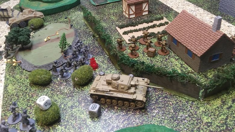 A miniature diorama depicts a battle in 1500s Italy.