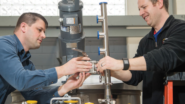 James Carucci ’01, electrical design manager at Process and Data Automation, and Chuck Capper, a senior Electrical and Computer Engineering Technology student.