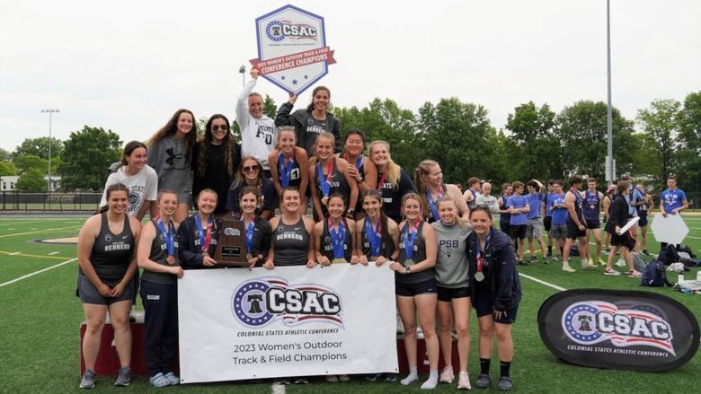 The Penn State Behrend women's track and field team celebrates its CSAC championship win.