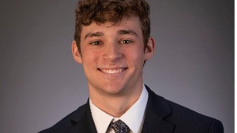 Photo of Owen Valasek in black suit