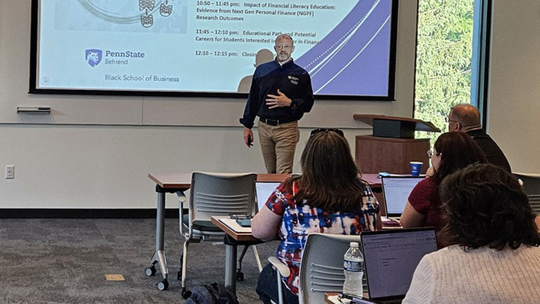 An instructor speaking to a classroom of students