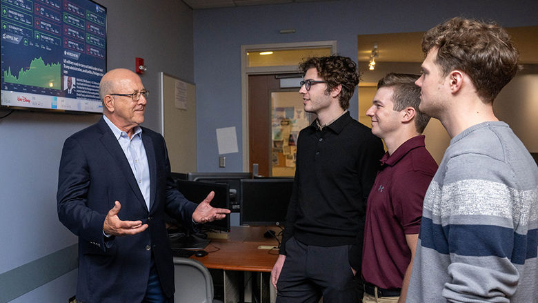 Vincent Intrieri speaking with students