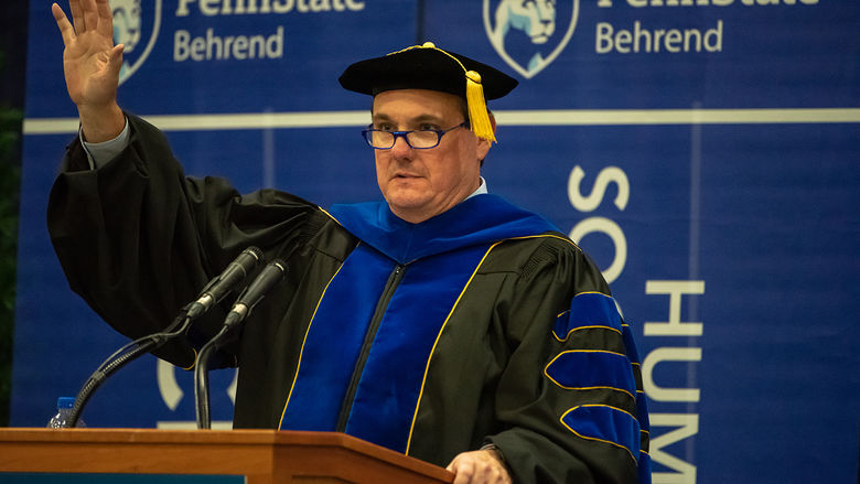 Dr. Charles Brown speaking at commencement