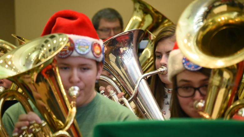 Tuba players perform Christmas standards at Penn State Behrend's annual Tuba Christmas concert.