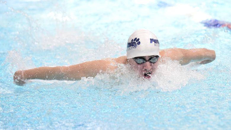 Penn State Behrend swimmer Liam Watterson swims in a race.