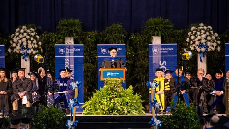 Michael Rutter, associate professor of statistics at Penn State Behrend, delivers the faculty address at the college's spring commencement ceremony.