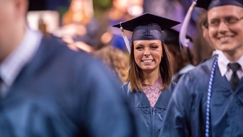 A close-up of a student at Penn State Behrend's spring commencement ceremony.