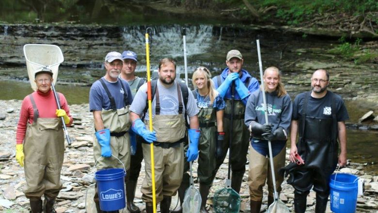 Members of the Pennsylvania Sea Grant staff pose for a group photo during a watershed research project.