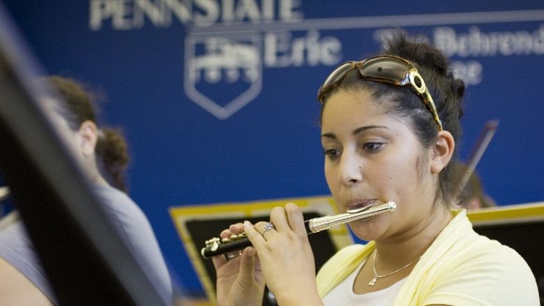 A student rehearses with the Penn State Behrend Concert Band