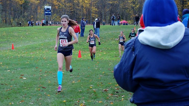 Penn State Behrend runner Savanna Carr competes at the AMCC championships.
