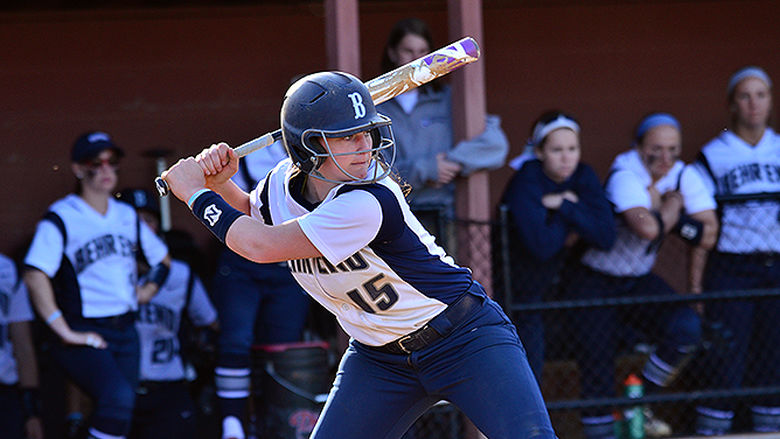 A Penn State Behrend softball player waits for a pitch.