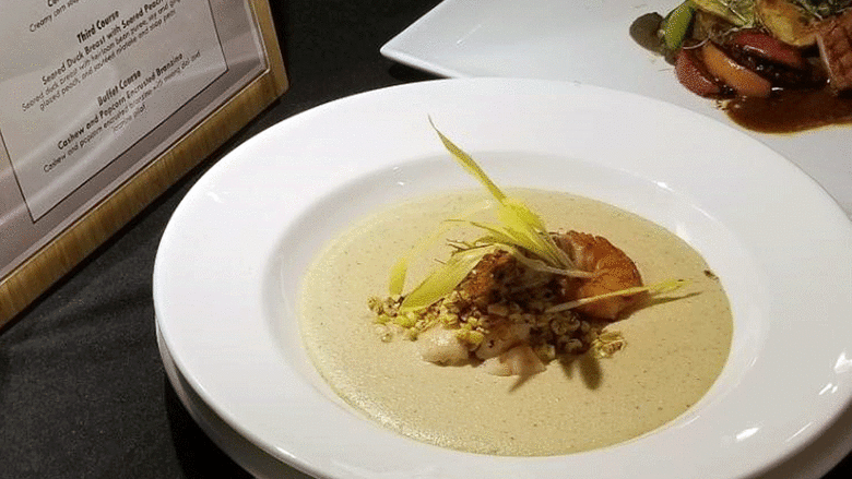 A bowl of corn and shrimp soup