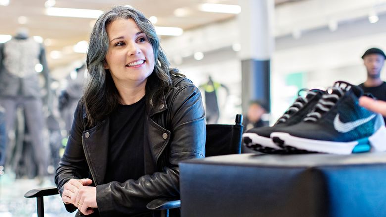 Nike designer Tiffany Beers poses with the company's HyperAdapt 1.0 shoes.