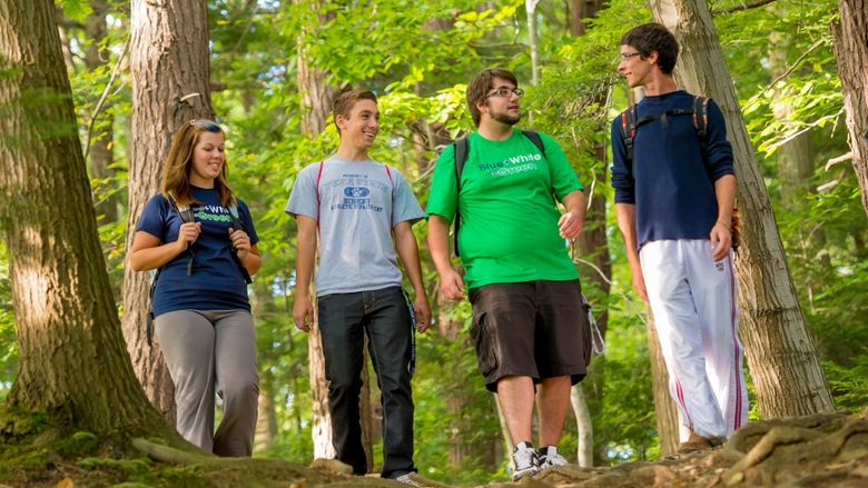 Students walk through Wintergreen Gorge at Penn State Behrend.