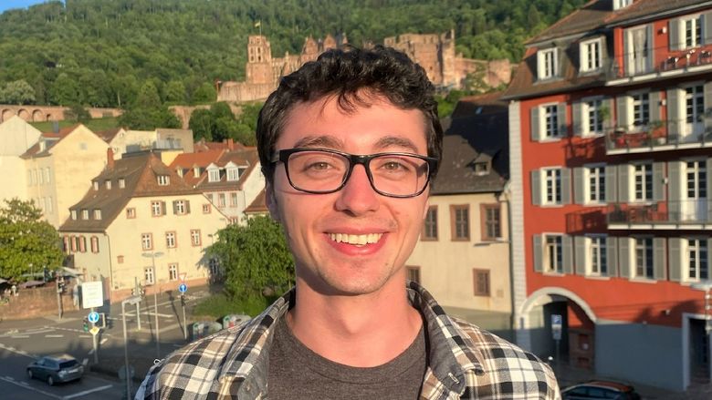 Aubin Kotewicz, a Penn State Behrend student, stands on a street in Pforzheim, Germany.