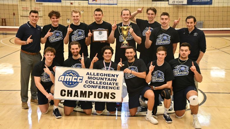 The Penn State Behrend men's volleyball team celebrates after winning the AMCC championship.