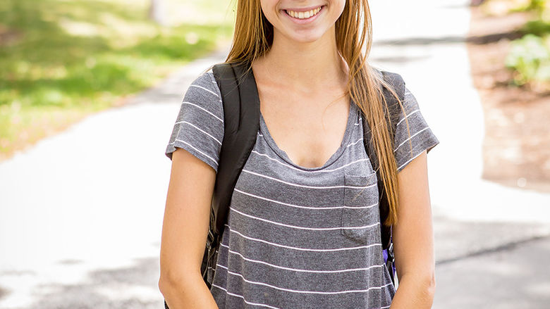 Transfer student in front of Reed Union Building