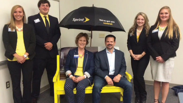Students in Dr. Mary Beth Pinto’s MKTG 344 Buyer Behavior class competed to create guerrilla marketing plans for Sprint. The winning team, “We’ve Got You Covered,”— Shelby Lunz, Becker Nezballa, Nicole Krahe, and Britnee Terrill—are pictured with Pinto and Marc Nachman, regional president for Sprint.
