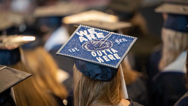 A student shows off her mortarboard cap during Penn State Behrend's spring 2023 commencement ceremony.