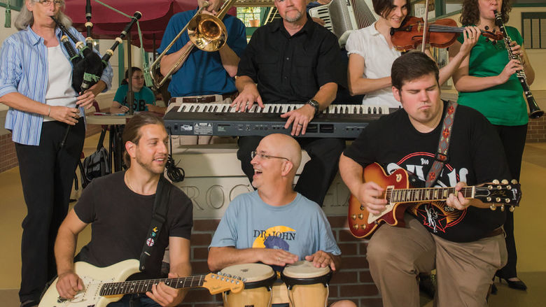 Musically-inclined members of the School of Science faculty include, first row, from left, Dr. Daniel Galiffa, Dr. John Steffen, and Peter Olzewski, standing in back, from left, Dr. Pam Silver, Jonathan Hall, Dr. Michael Justik, Paul Olson, Dr. Lauren Falco, and Jodie Styers.