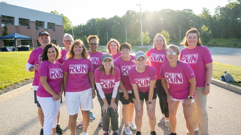 group of WEC women posing at the Run for Women 5K