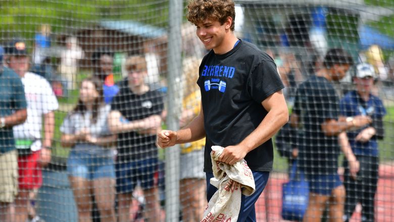 Track-and-field athlete Dan Dabrowski celebrates after a discus throw.