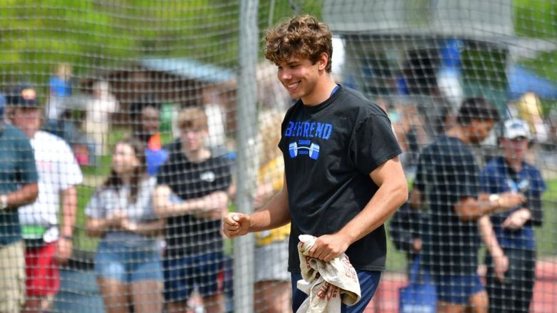 Track-and-field athlete Dan Dabrowski celebrates after a discus throw.