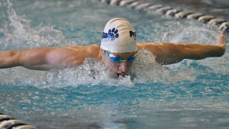 Penn State Behrend swimmer Tim Compton competes in a fly event.