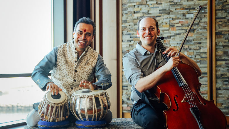 A publicity photo of Sandeep Das and Mike Block, who perform as "East Meets West."