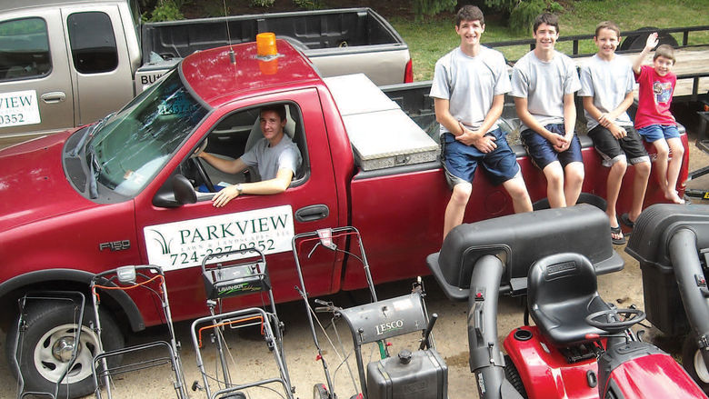 Bill Staniszewski, in the truck, and his brothers own and operate Parkview Lawn and Landscape in New Kensington.