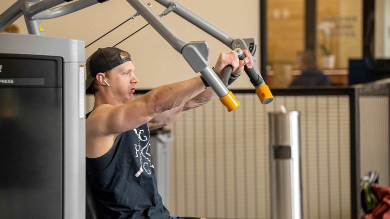 A student exercises at Penn State Behrend's new Erie Hall.