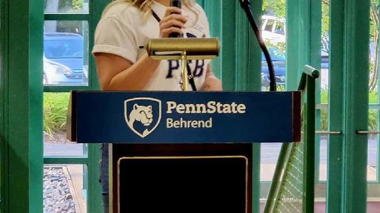 Alumni giving speech