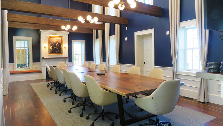 The conference room at the Federal House includes a stunning table custom-made from a large black walnut tree that had to be removed to make room for the expansion.