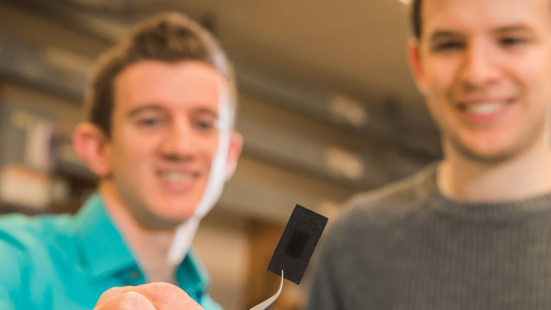 Dr. Adam Hollinger, associate professor of mechanical engineering, left, and Dan Doleiden, senior Mechanical Engineering major.