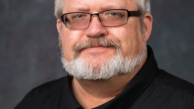 A portrait of Penn State Behrend faculty member George Looney
