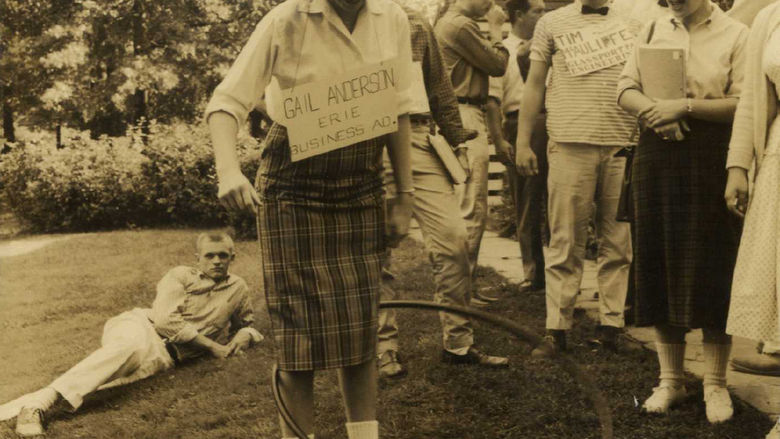 Students mingle with a hula hoop outside Glenhill Farmhouse at Behrend Center