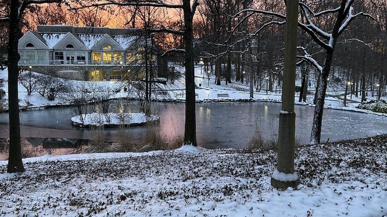 A winter sunset behind a campus building