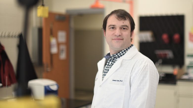 A portrait of Penn State Behrend faculty member Jeremiah Keyes in the college's new microbiology lab.