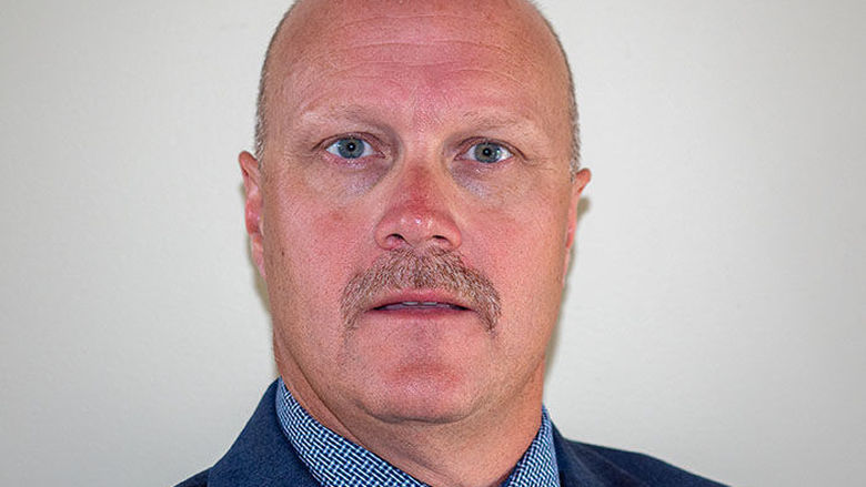 A portrait of Penn State Behrend alumnus Joseph Snyder.