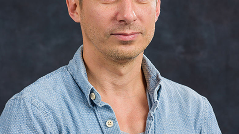 A portrait of Joshua Shaw, professor of philosophy and bioethics at Penn State Behrend.