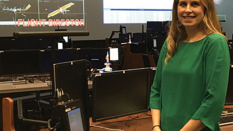 Mary Lawrence ‘01 in the mission control center at NASA in Houston.