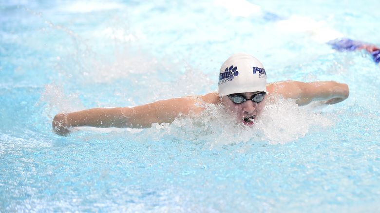 Penn State Behrend swimmer Liam Watterson competes in a race.