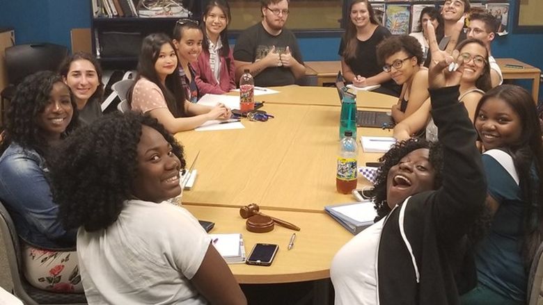 Students smiling during meeting