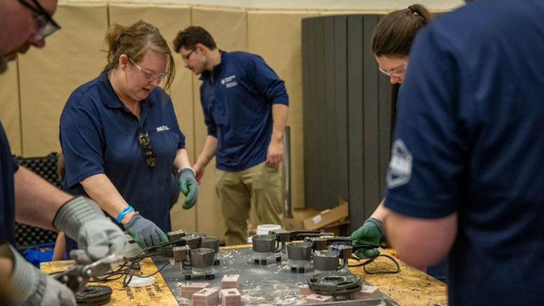 A Behrend teams presenting a metal workshop