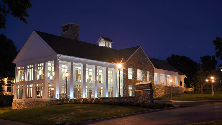 An image of Penn State Behrend's Metzgar Center at night.