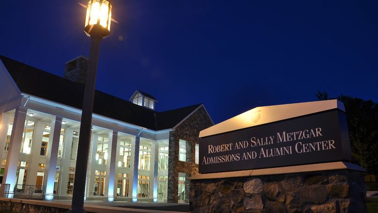 A nighttime photo of Penn State Behrend's Metzgar Center
