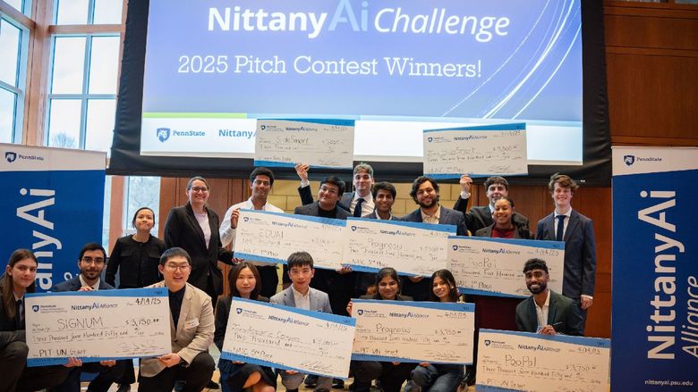 college student winners display giant award checks